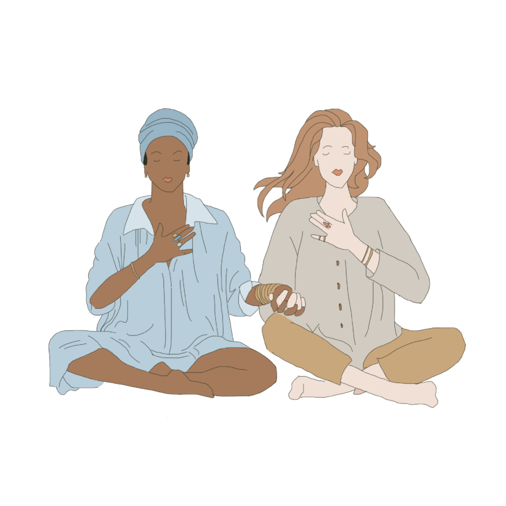 Two women holding hands and praying